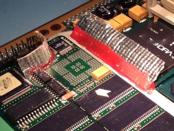 The Heat Shield Blanket insulates temperature-sensitive components.