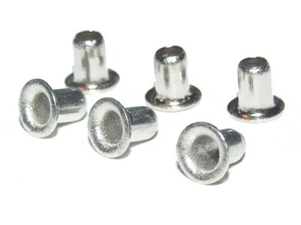 Two sizes of eyelets to practice plated-hole repair.